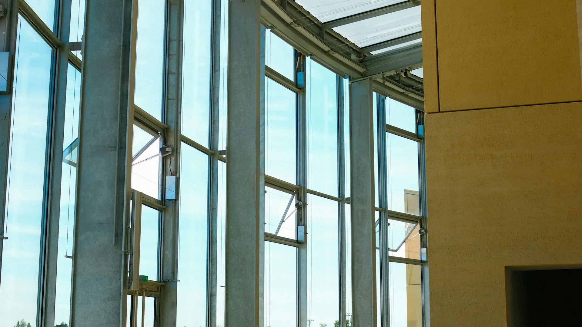 Professional glazier installing window glass