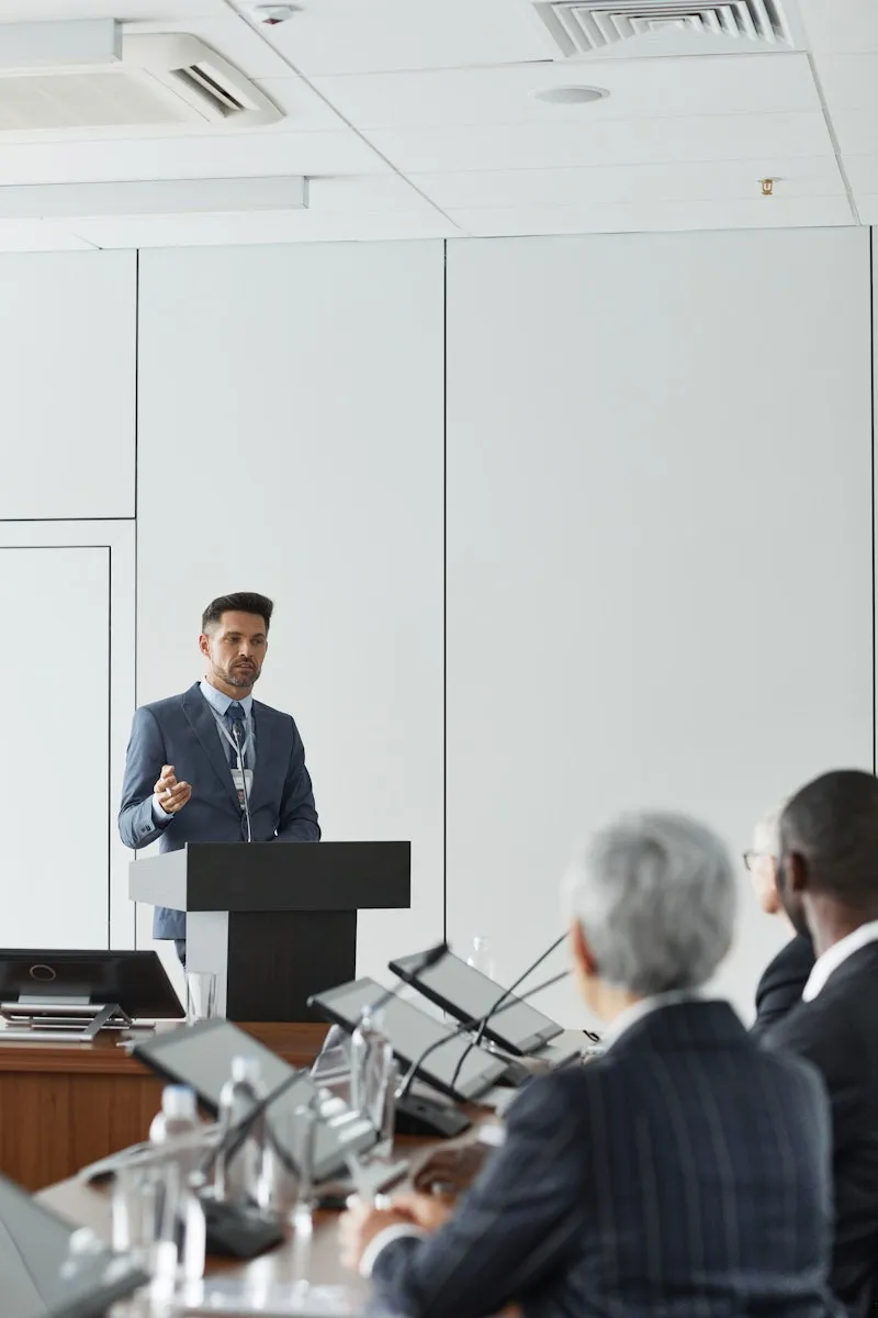 Speaker presenting at business conference