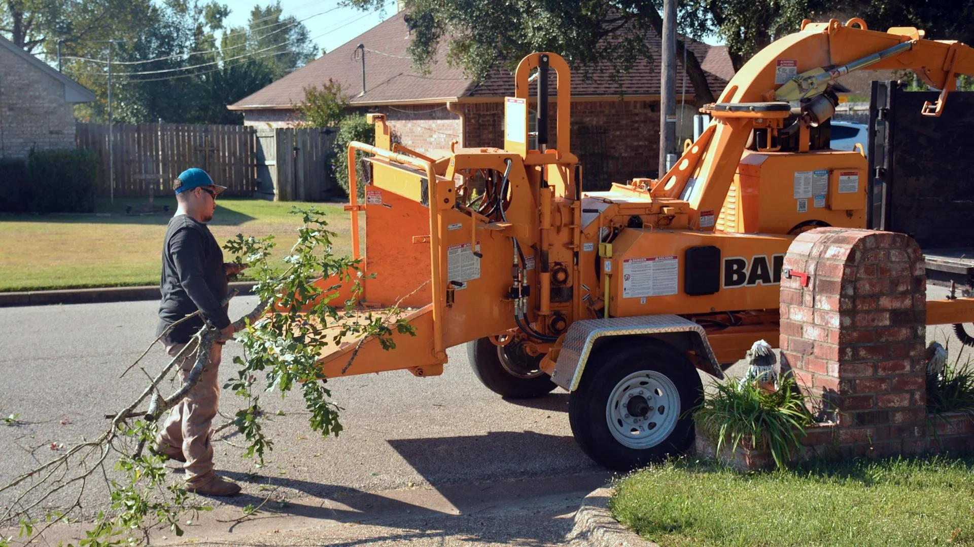 Stump grinding machine in operation