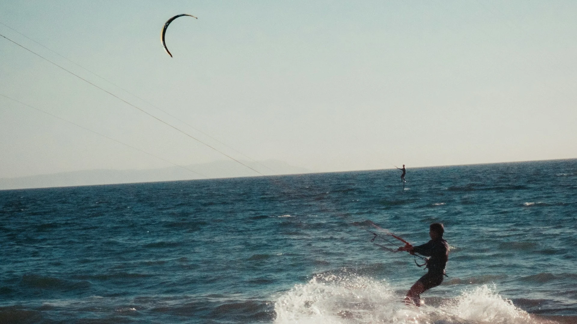 Kite surfer on ocean