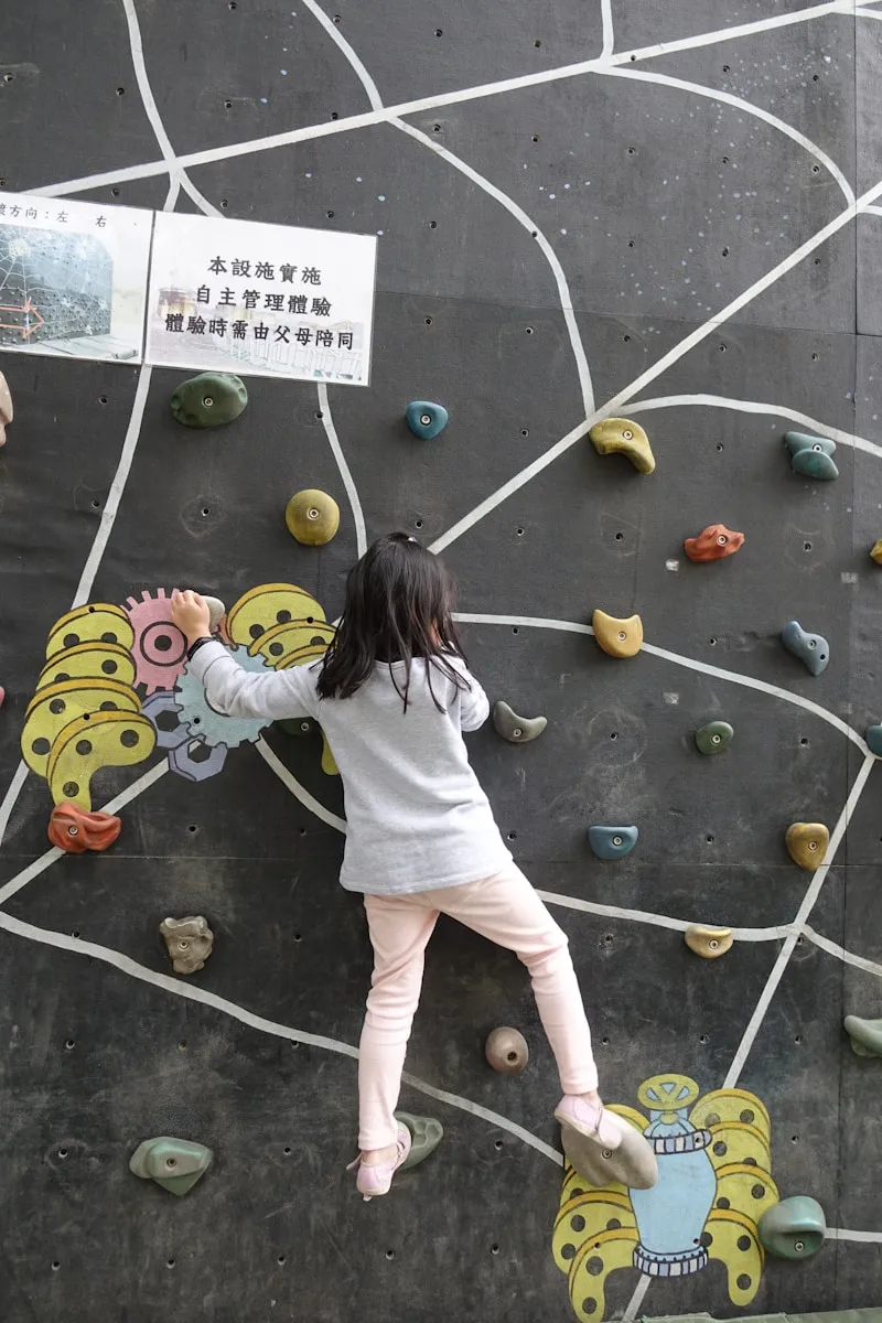 Person climbing indoor wall