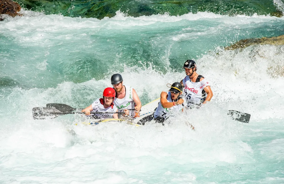 Group white-water rafting through rapids
