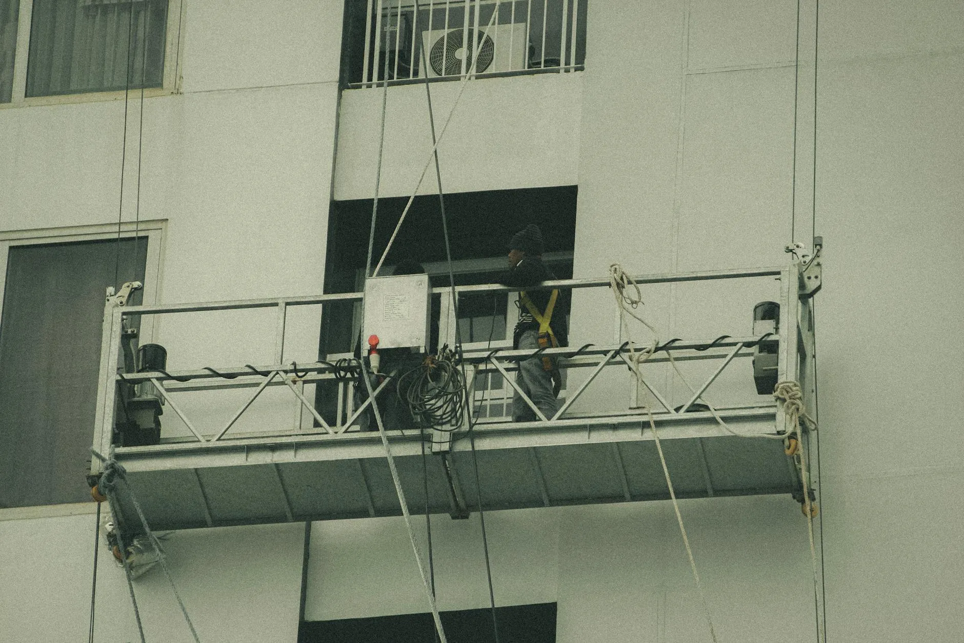 School maintenance worker conducting safe repairs