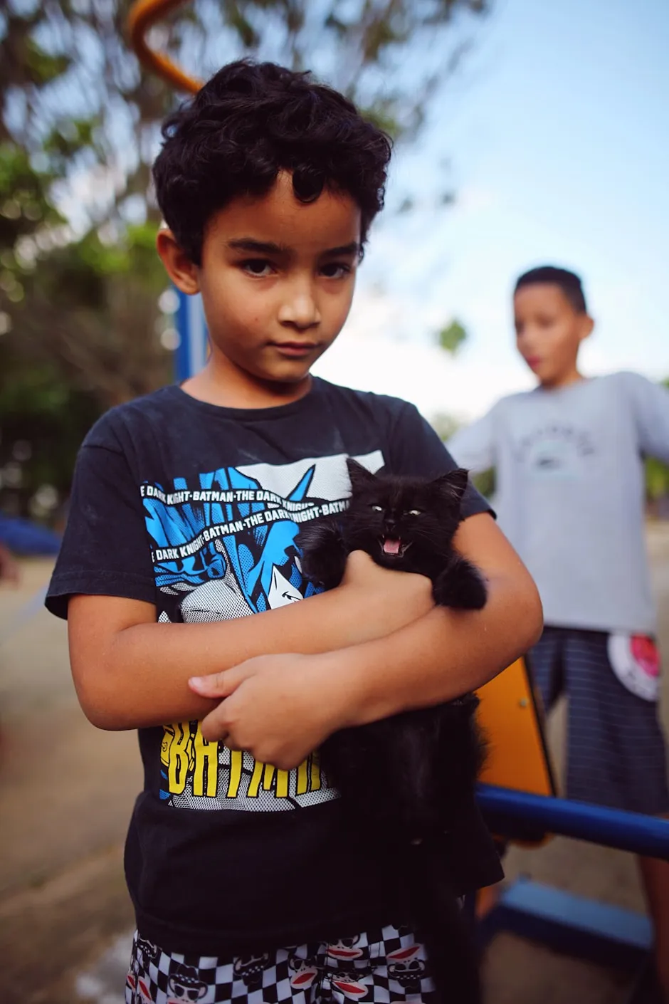 Child safely handling classroom pet