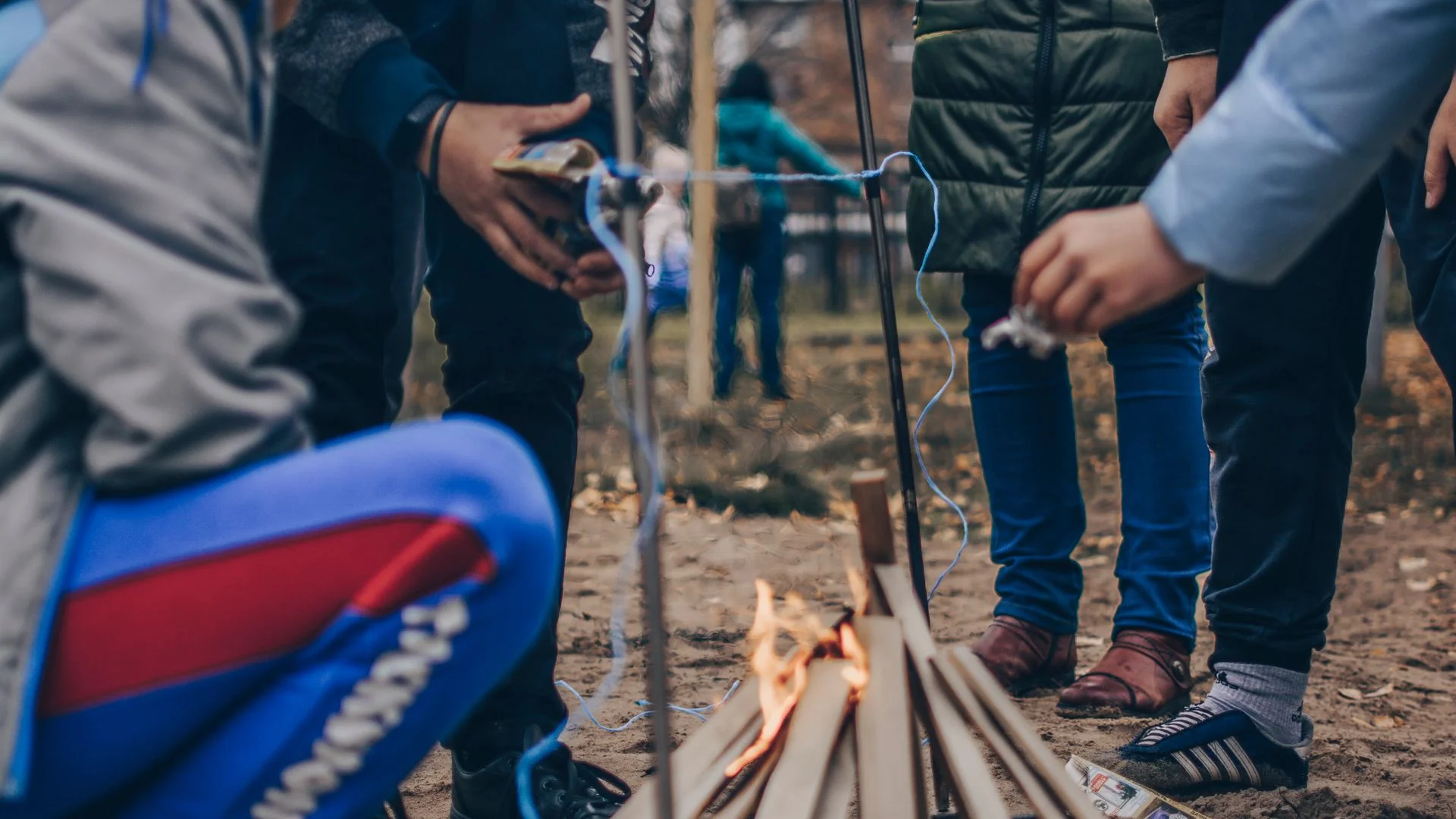 Children learning outdoors in forest school