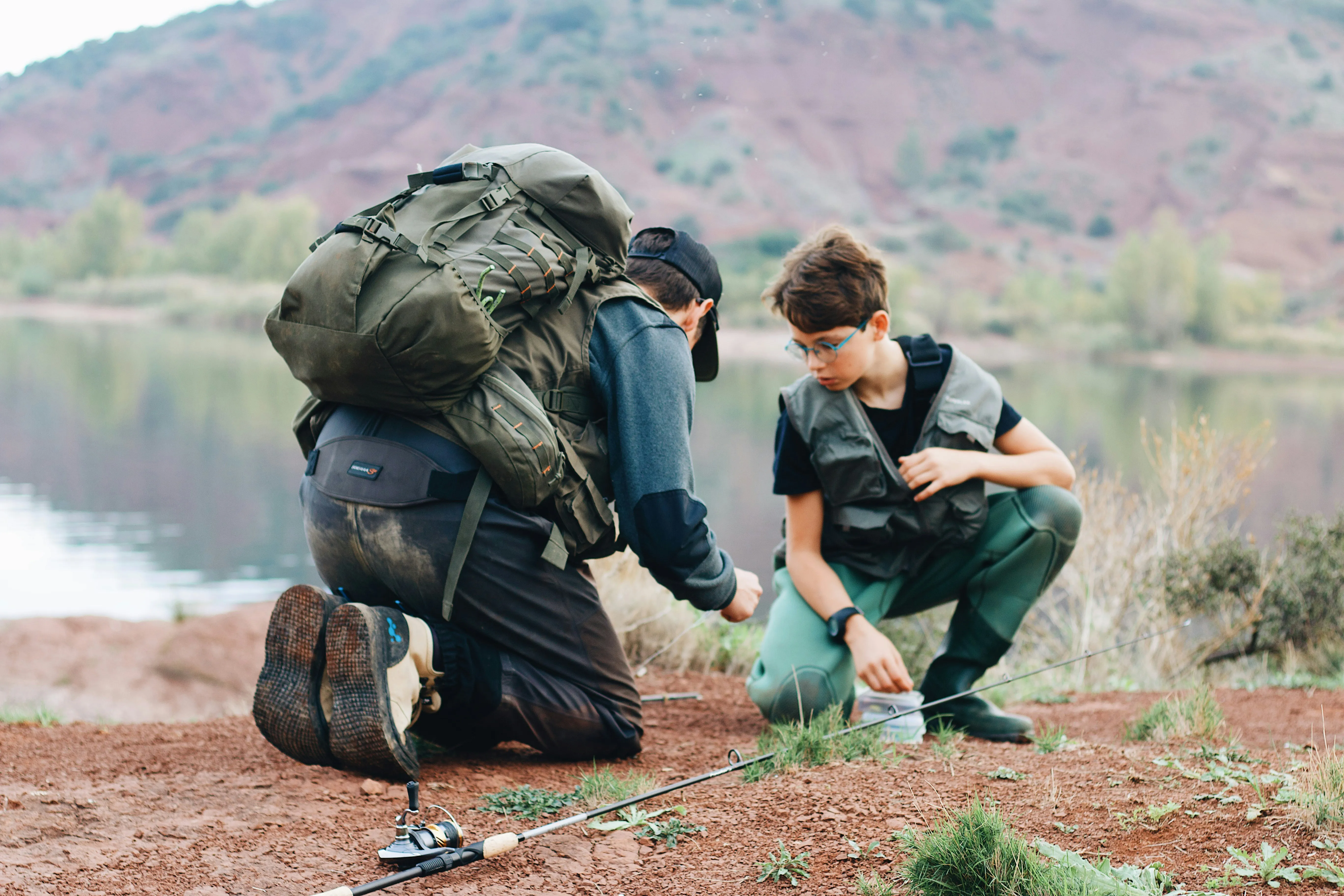 Person using GPS device for geocaching