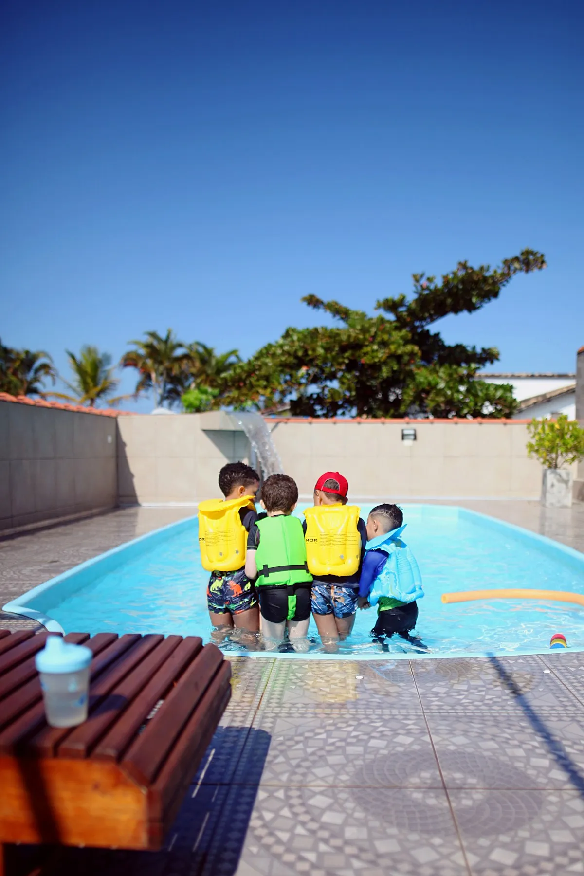 Children at swimming pool lesson