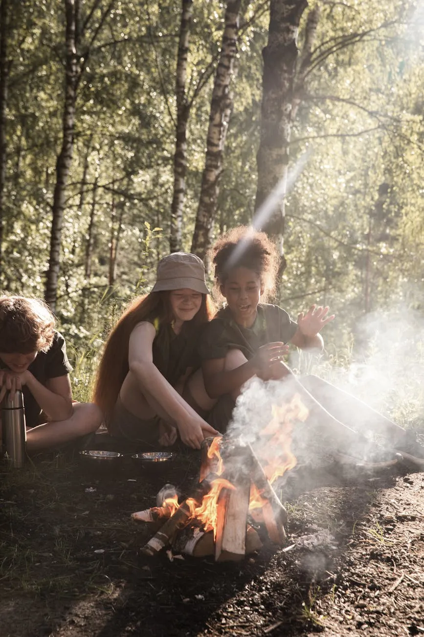 Youth gathering around campfire