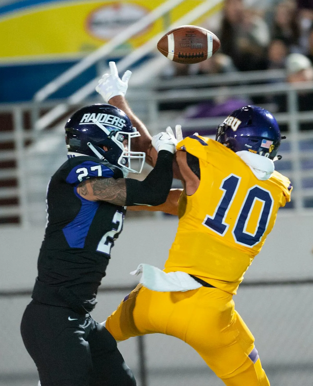 American football players in action during a game