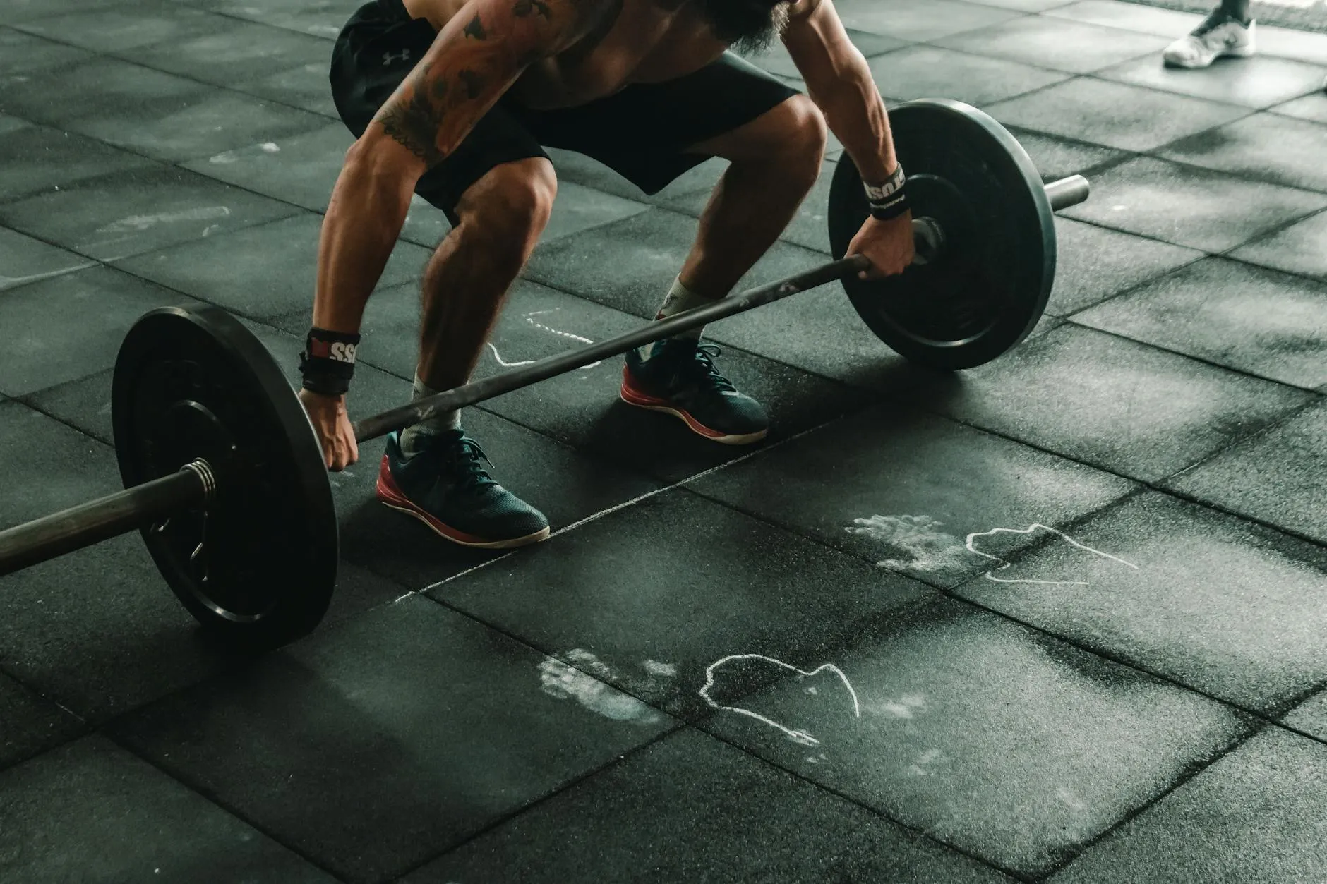 CrossFit athlete preparing for barbell lift
