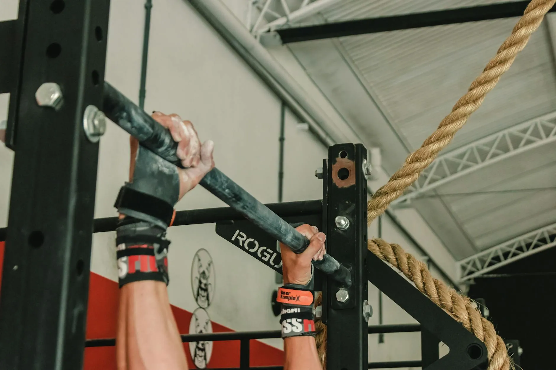 CrossFit athlete on pull-up bar