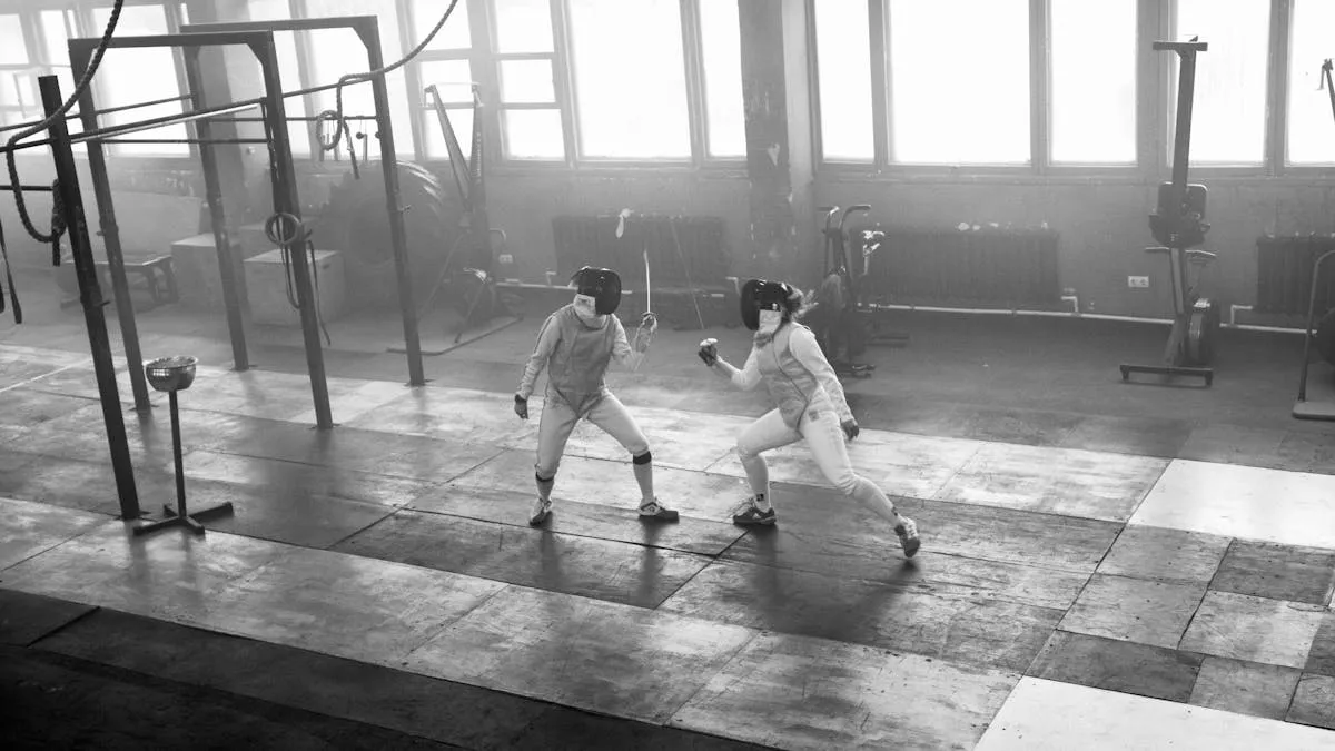 Two fencers dueling with swords in competition