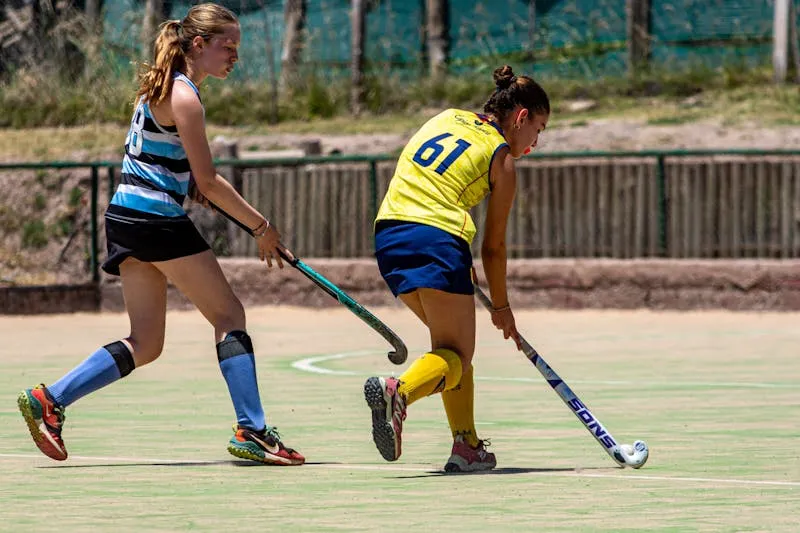 Female athlete playing field hockey