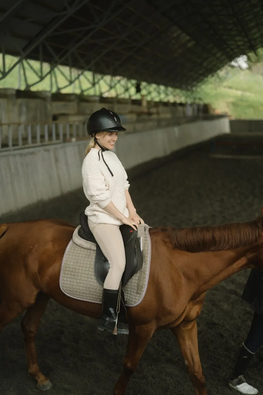 Horse rider in indoor arena