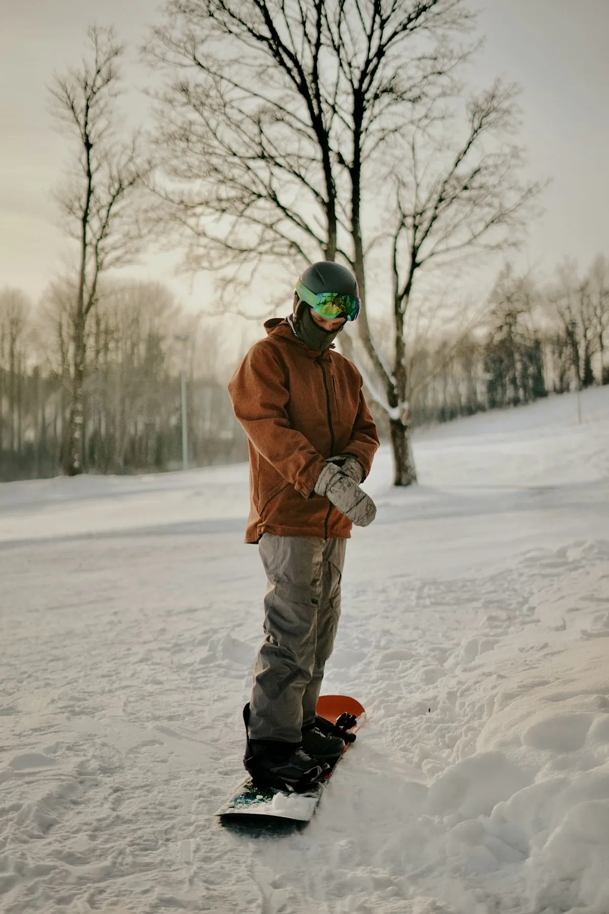Snowboarder performing jump on mountain