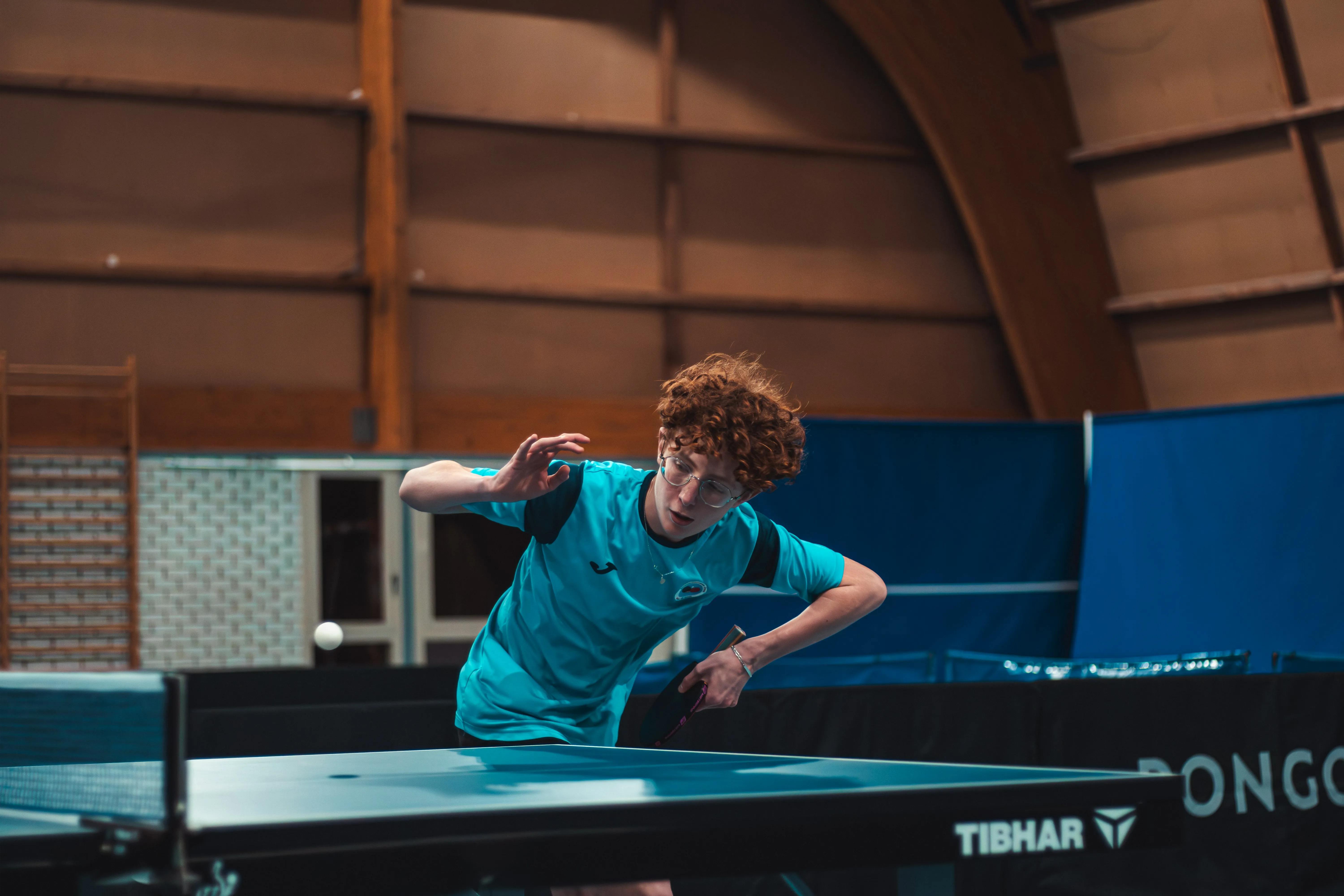 Table tennis player in action