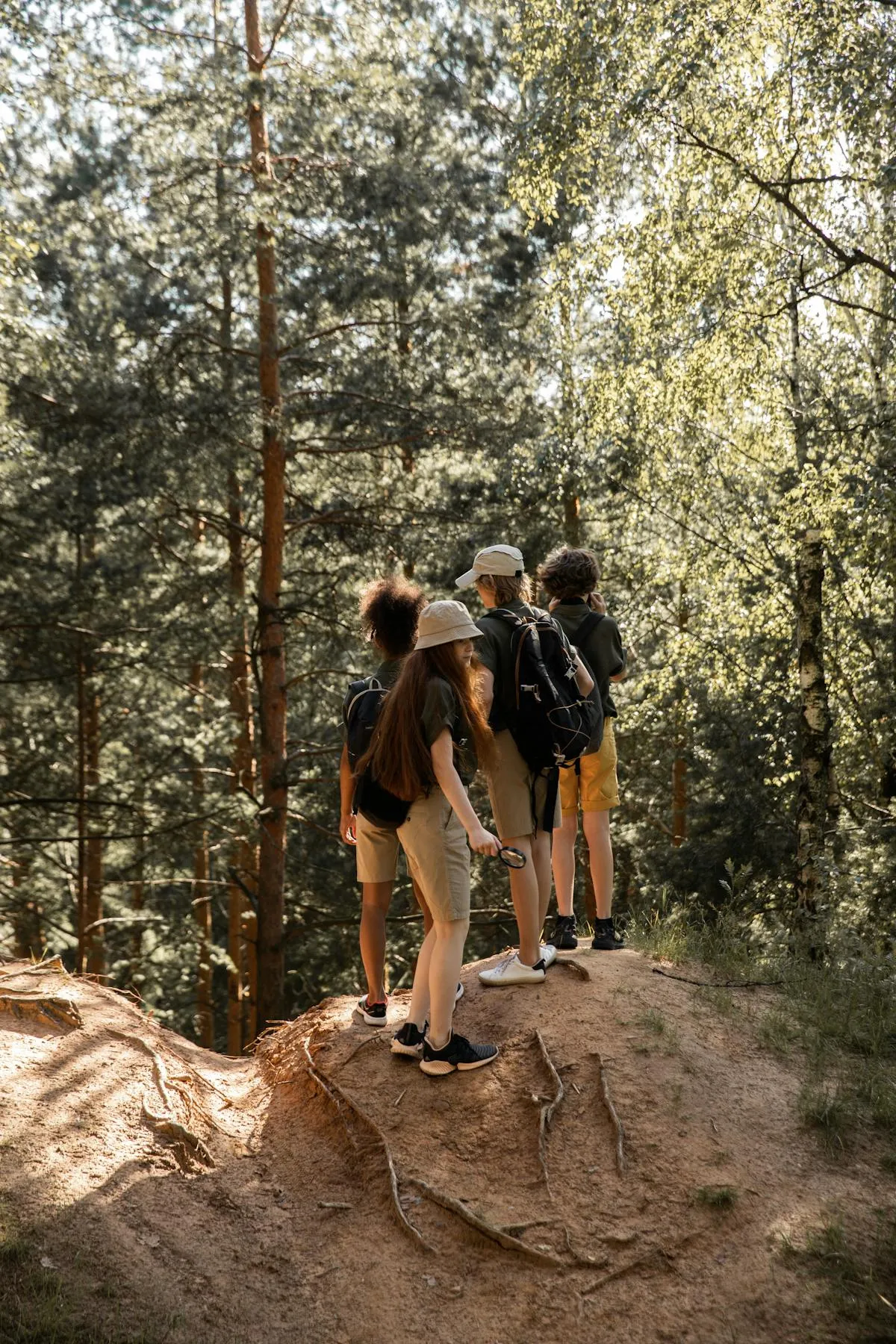 Youth group hiking on trail