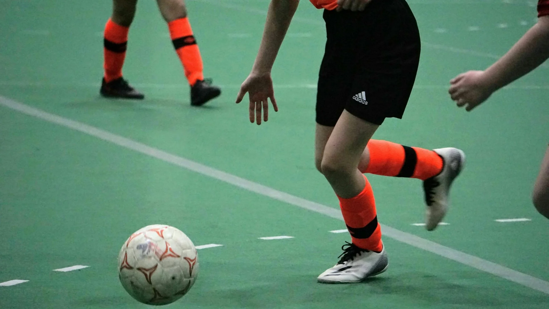 Youth playing indoor sports