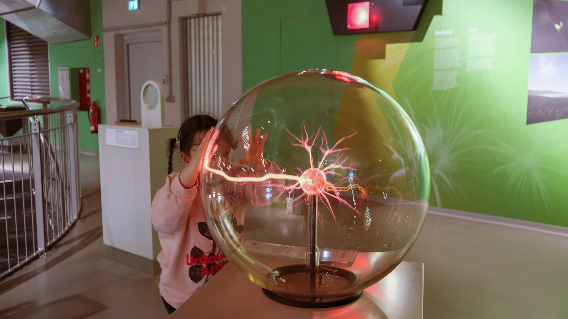Youth group exploring museum exhibits